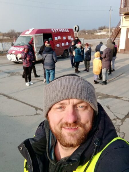 The man who evacuated 200 people from mariupol in a battered red van - photo licensed by shore news network.