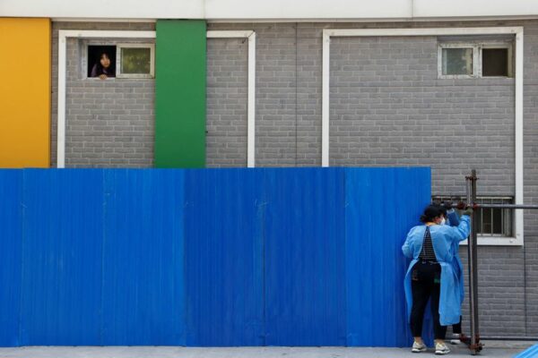 Beijing steps up covid curbs as virus spreads in china
