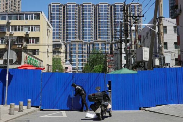 Shanghai aims to defeat covid over next week as beijing hunkers down