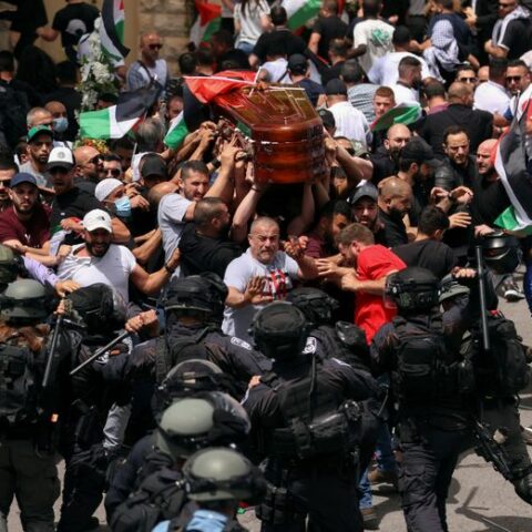 Israeli police beat mourners at funeral of slain palestinian journalist - photo licensed by shore news network.