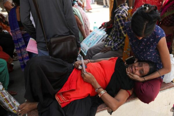 Building fire kills 27 in new delhi, police arrest company owners