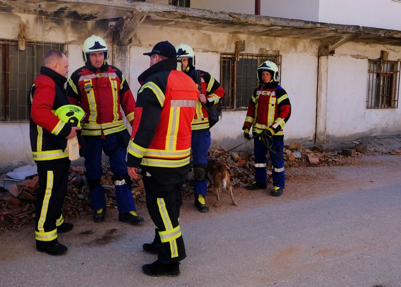Ukrainian rescuers fly in from war zone to save lives in Turkey