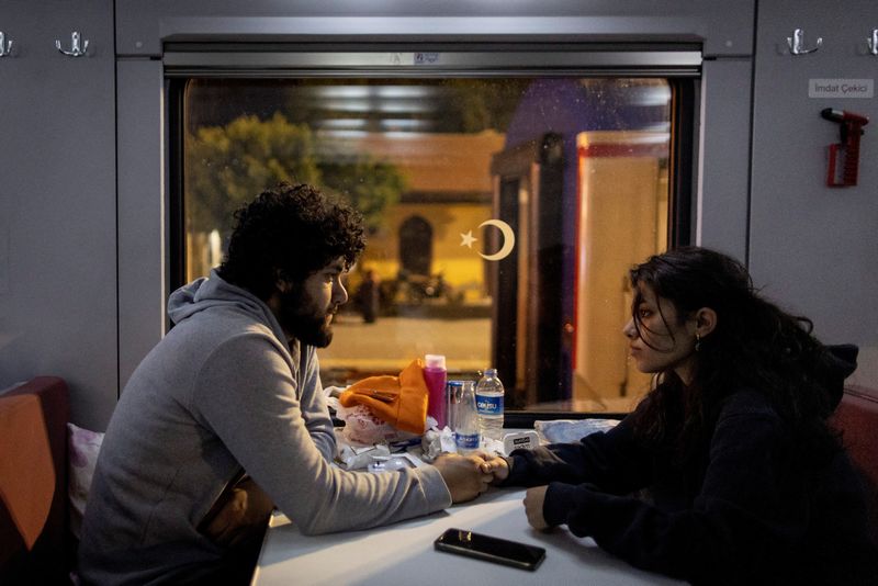 Turkish families shelter on a train after earthquake brought life to a standstill