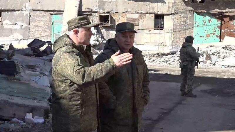 Russian defence minister pays rare visit to troops in Ukraine