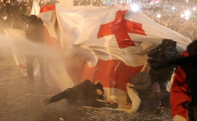 Georgian police use tear gas to halt protest against 'foreign agents' law
