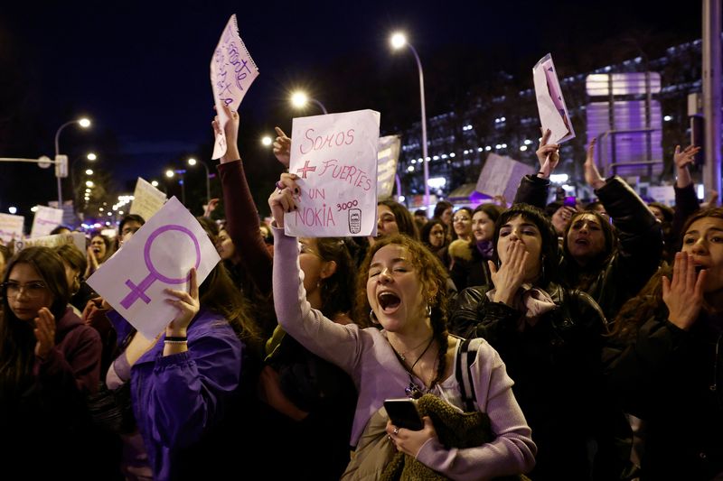 Women's Day protesters rally for rights, with focus on Iran and Afghanistan