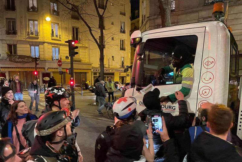 Paris police, protesters clash for third night over Macron's pension reform