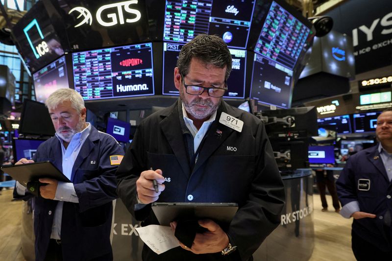 Nasdaq outperforms as investors cheer Microsoft, Dow transports sink