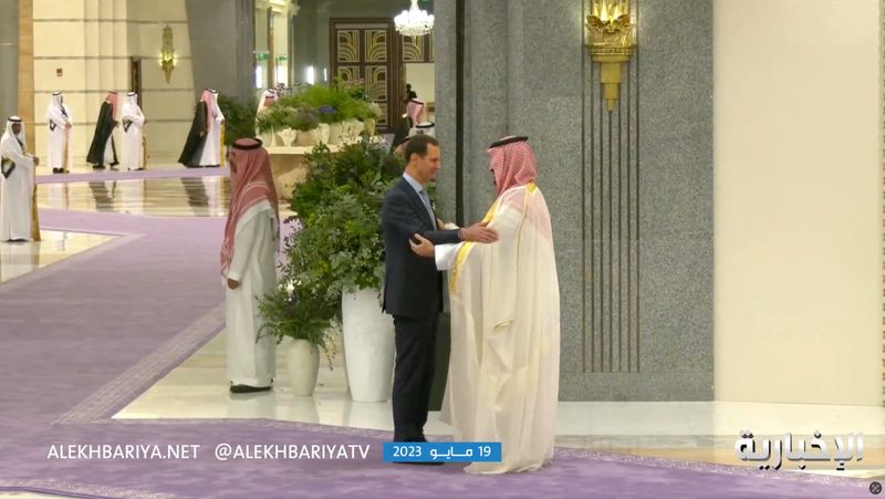 Syria's Assad shakes hands, kisses cheeks with onetime foes at Arab League summit