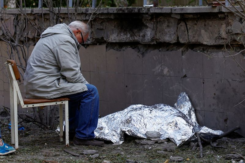 Russia says it repels border incursion, strikes on Kyiv kill three
