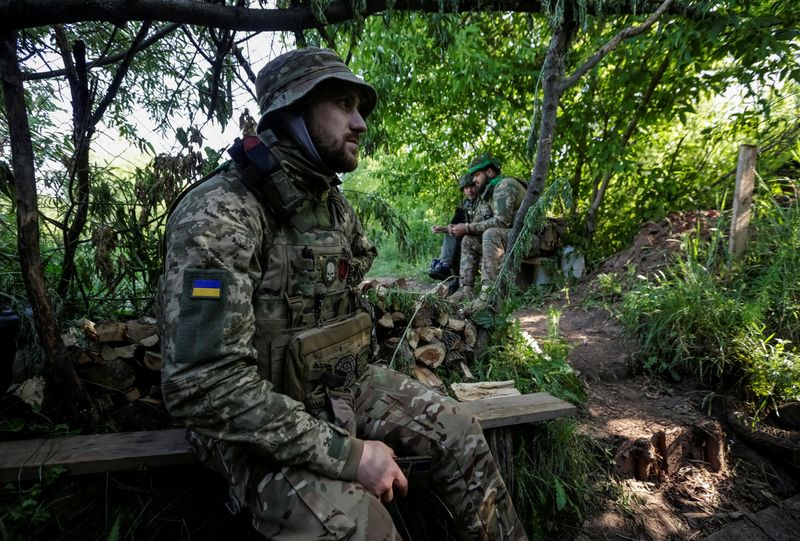 Russia reports fierce fighting, Zelenskiy praises troops, counter-offensive