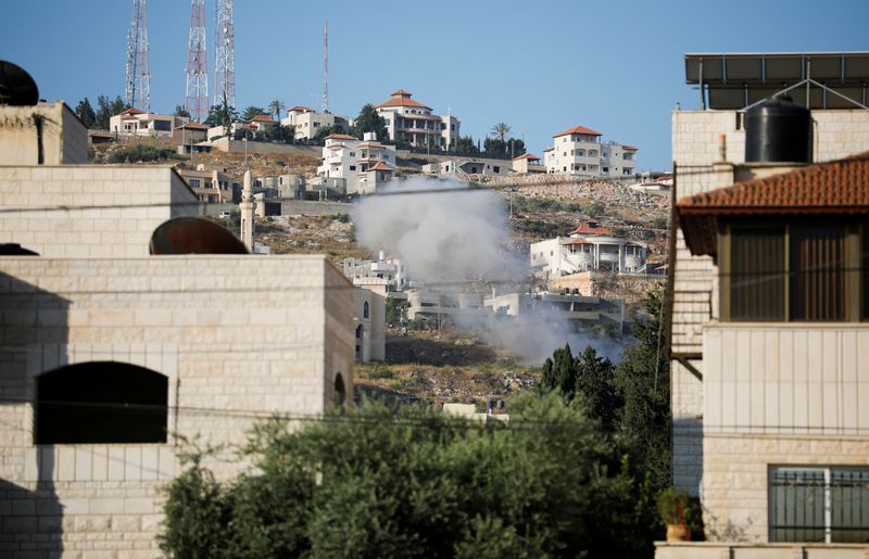Israeli troops, backed by helicopter, kill 5 Palestinians in clash