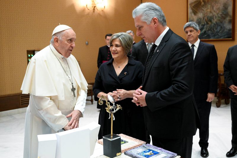 Pope meets Cuban president as small protest held away from Vatican