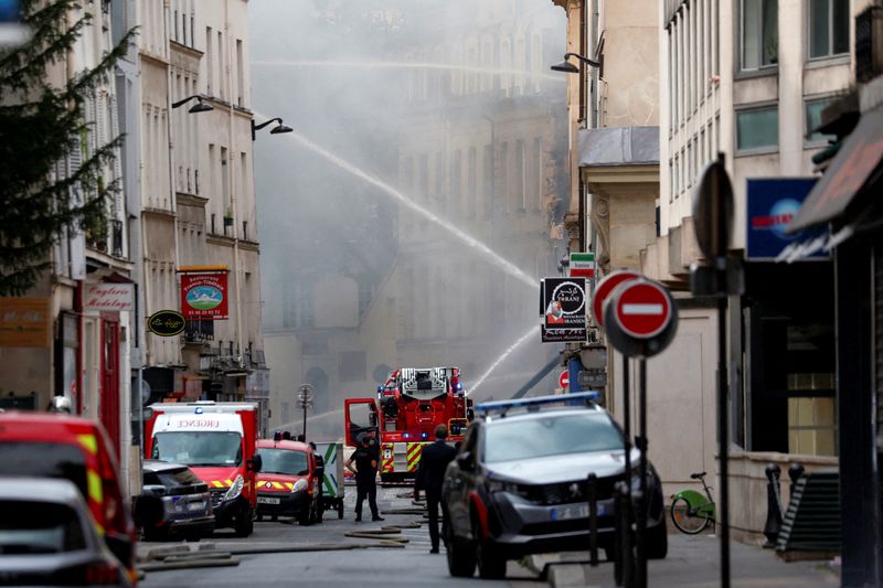 After Paris blast, shaken locals wait anxiously nearby