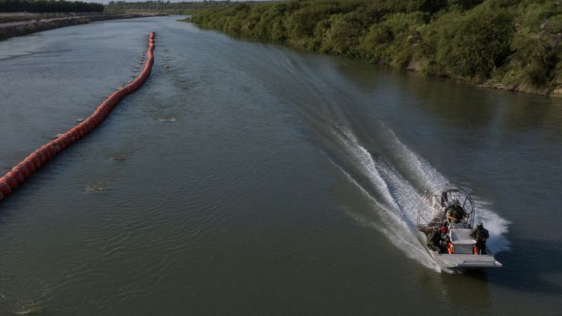 Body found in river buoys at Mexico border amid criticism of policy
