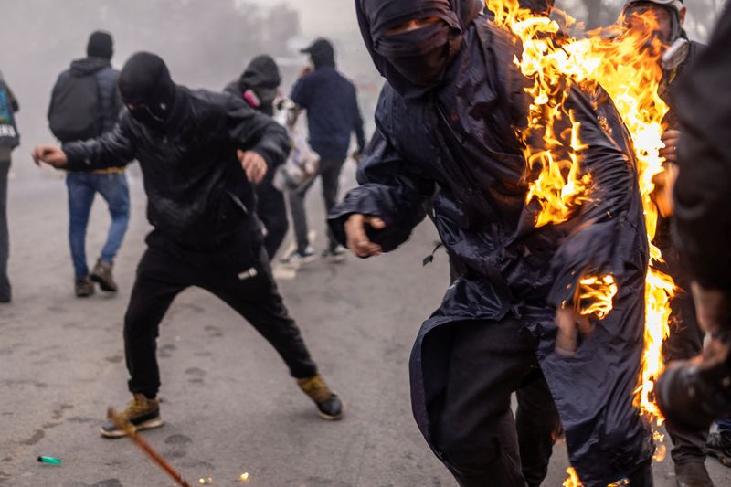 Chile, Mexico presidents call for democracy, Santiago protests flare on eve of coup anniversary