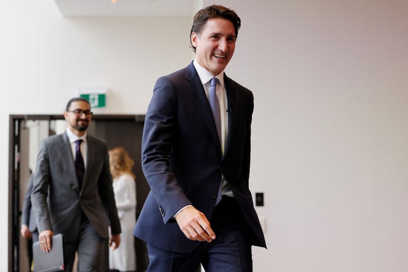 Canada PM Trudeau dismisses talk of stepping down, says much work to do