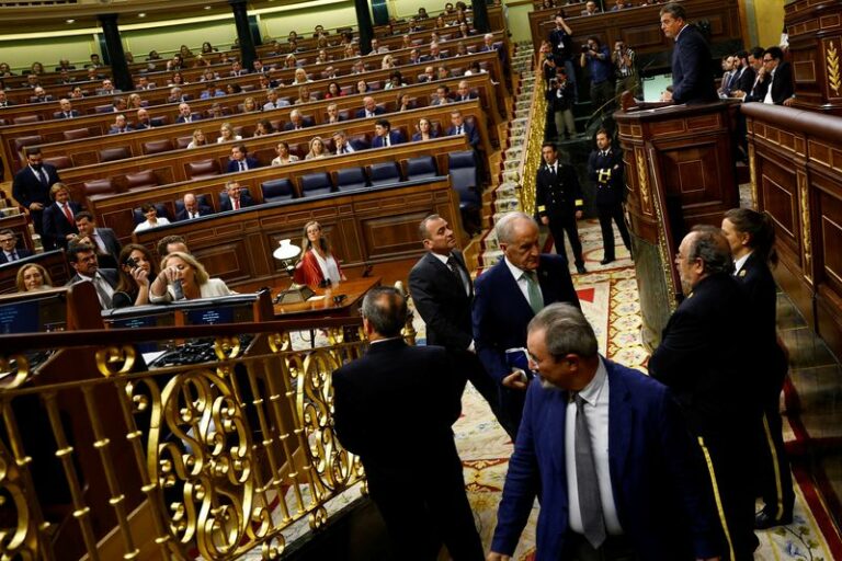 Spain lawmakers don earphones as regional languages make debut in lower house - photo licensed by shore news network.