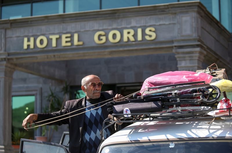 Fleeing Karabakh, elderly couple fear for the future with their disabled son