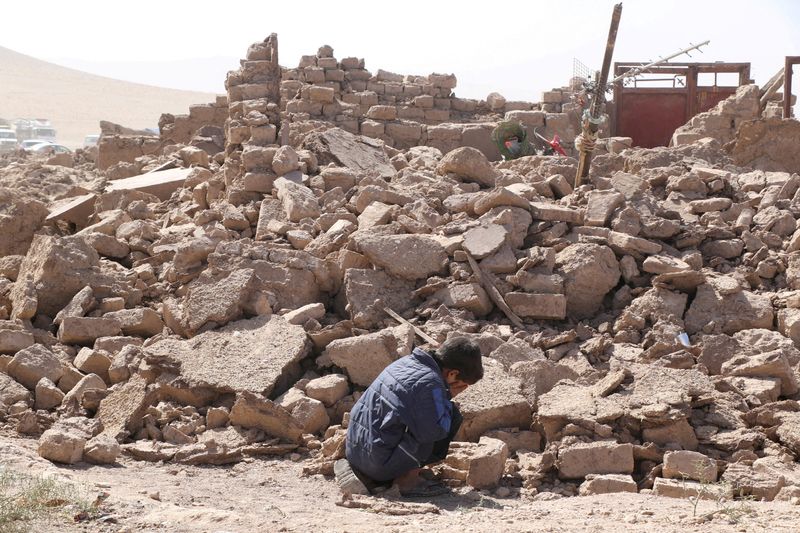 Afghan earthquakes kill 2,445, Taliban say, as deaths mount