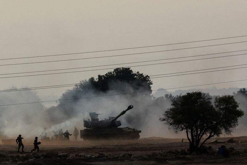 Israel on war footing, Hamas threatens to kill captives