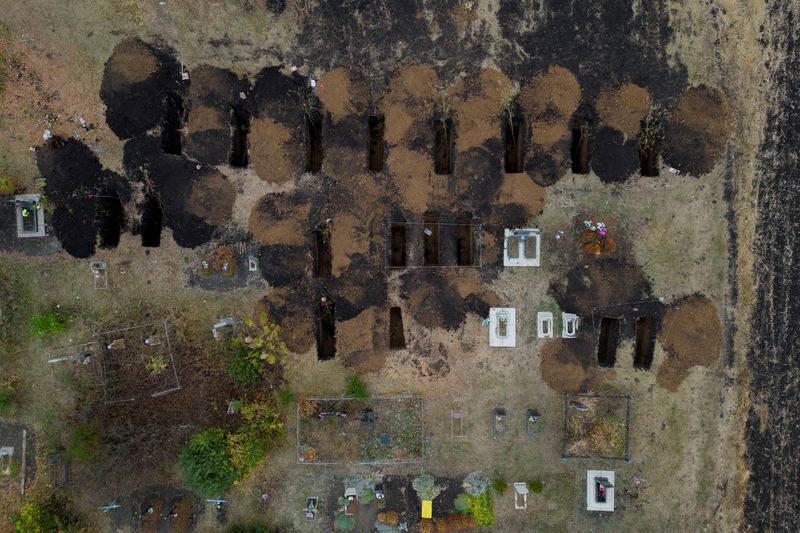Ukraine accuses two men of helping guide missile that killed dozens in Hroza village