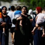 Families of staff of international organizations shelter at a United
