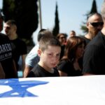 Funeral of woman killed in deadly Hamas attack at festival,
