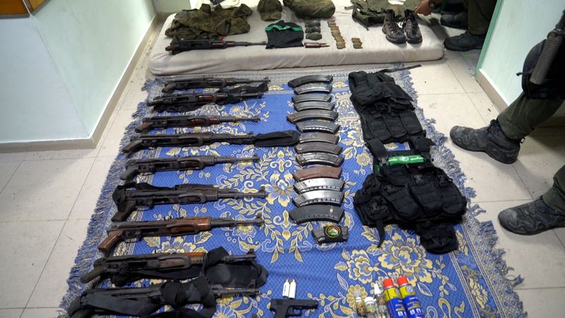 Israeli military shows video of arms it says were found at Al Shifa hospital