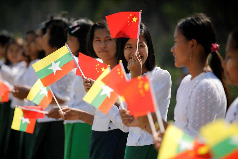 Myanmar convoy burns on China's border as its envoy meets for talks