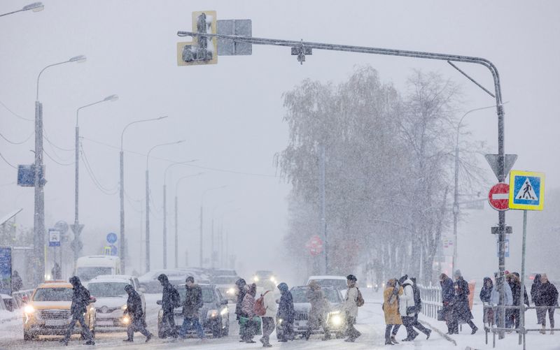 Russian man who traced 'No to War' in the snow gets 10 days in jail