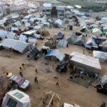 Displaced Palestinians, who fled their homes due to Israeli strikes,