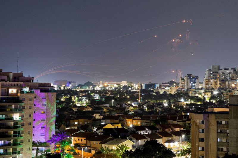 Israel pounds Gaza, Hamas fires rockets as Netanyahu indicates long war