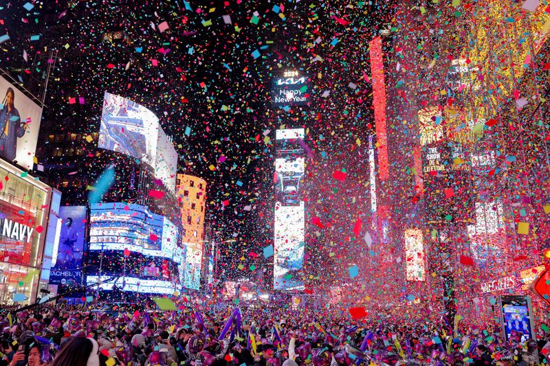 World welcomes 2024 with New Year's fireworks, reflection and a royal farewell