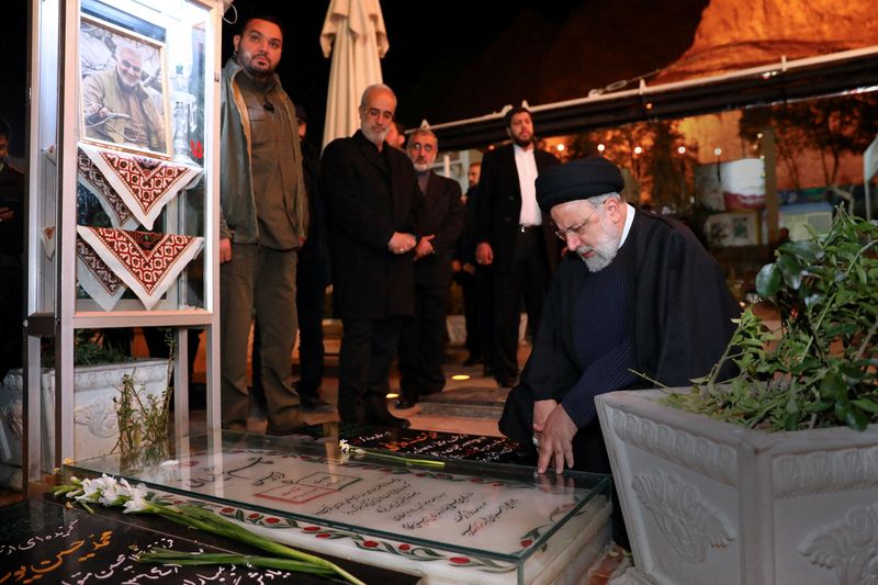 Iran arrests 11 suspects over bomb blasts, mourners demand revenge - state TV