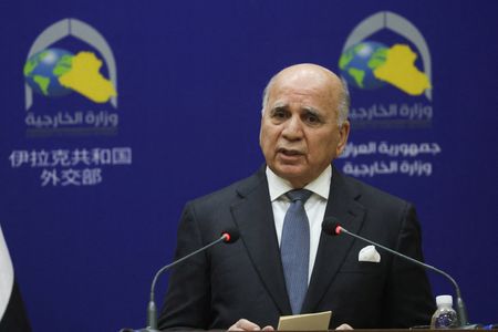 Iraq and US need to return to dialogue over future of coalition force, says Iraq foreign minister