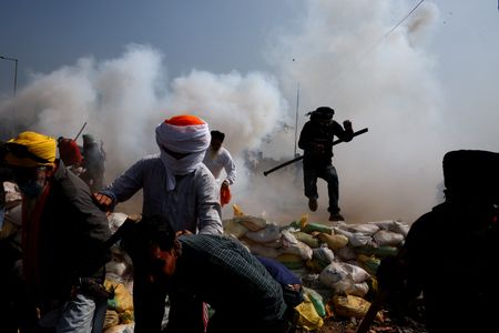Indian farmers pause protest march to Delhi after government offers talks