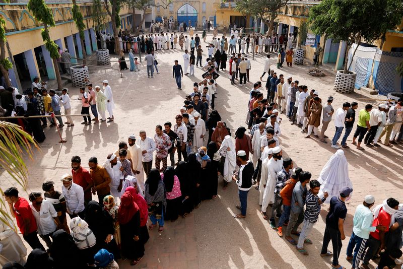 Indians vote in huge election dominated by jobs, Hindu pride and Modi