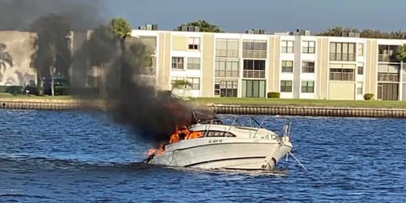 Man jumps from burning boat near Palm City Bridge Man jumps from burning boat near Palm City Bridge