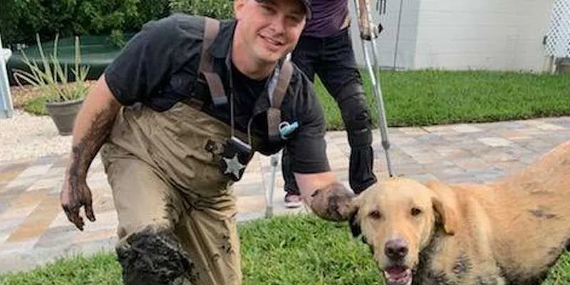 Deputy rescues dog from muddy canal Deputy rescues dog from muddy canal
