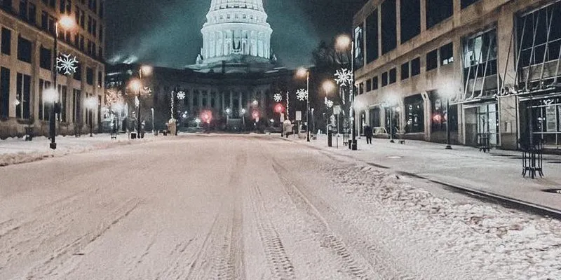 Madison Police Officer pushing crashed car off icy road nearly struck by car Madison Police Officer pushing crashed car off icy road nearly struck by car