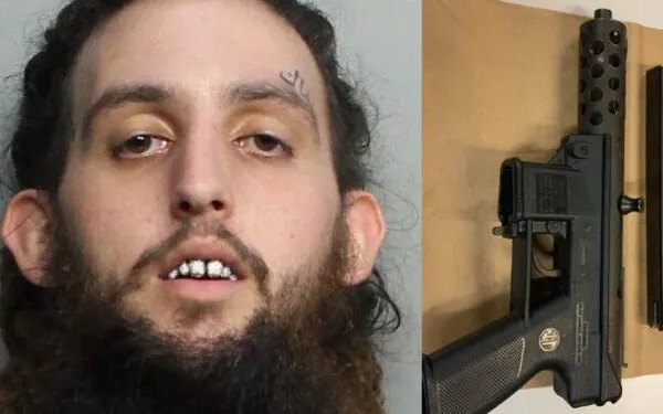 Man with impressive grill charged for drug and weapons charges in Miami Beach Man with impressive grill charged for drug and weapons charges in Miami Beach