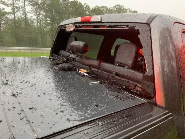 Lightning strike on highway caused chunk of road to smash through truck window Lightning strike on highway caused chunk of road to smash through truck window
