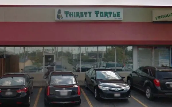 Two shot in the parking lot outside the Thirsty Turtle Two shot in the parking lot outside the Thirsty Turtle