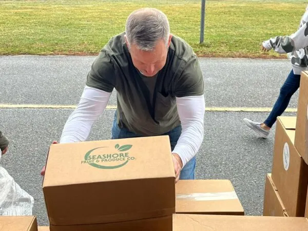 Turnbach, Maruca continue community giving in post-public life with food distribution for those in need Turnbach, Maruca continue community giving in post-public life with food distribution for those in need