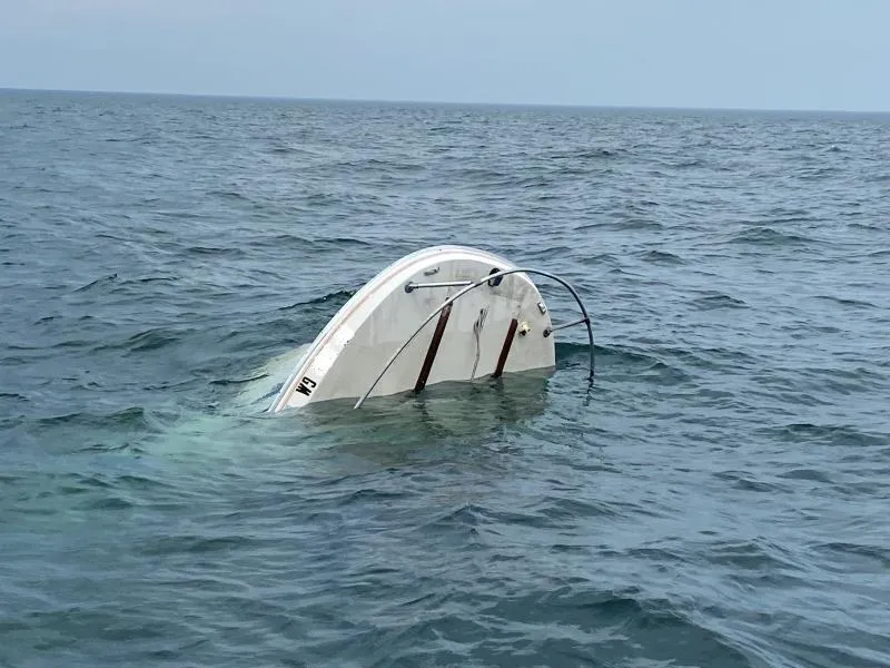 Recreational boater recused from his submerged boat on Lake Ontario by Air and Marine Interdiction Agents from the Rochester, N.Y. Marine Unit.