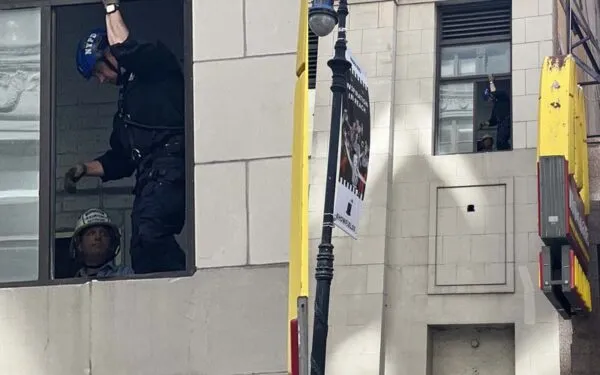 New York City Police Stop Suicide Building Jumper in Greenwich Village New York City Police Stop Suicide Building Jumper in Greenwich Village