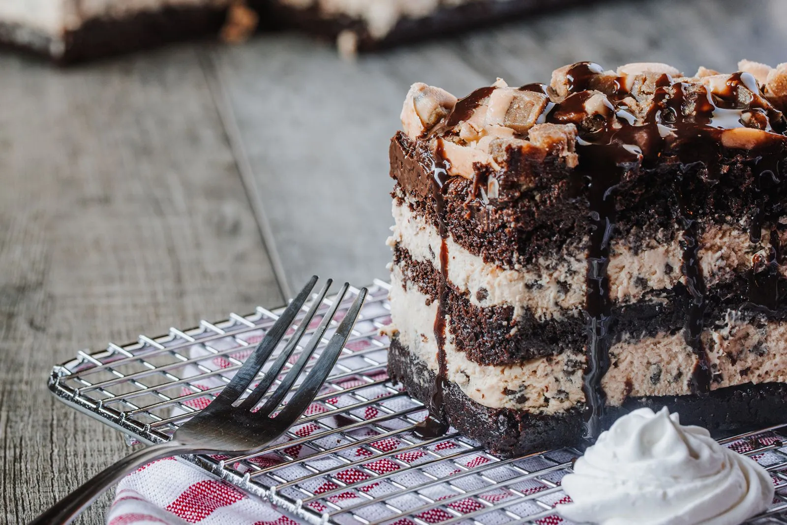 Logan's Roadhouse Cookie Dough Chocolate Cake Logan's Roadhouse Debuts Menu Revamp Starring Cinnamon Rolls and Two All-New Desserts
