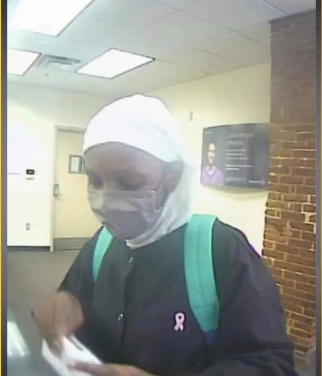 Baltimore Police Release Photos of Female Bank Robbery Suspect Image 12