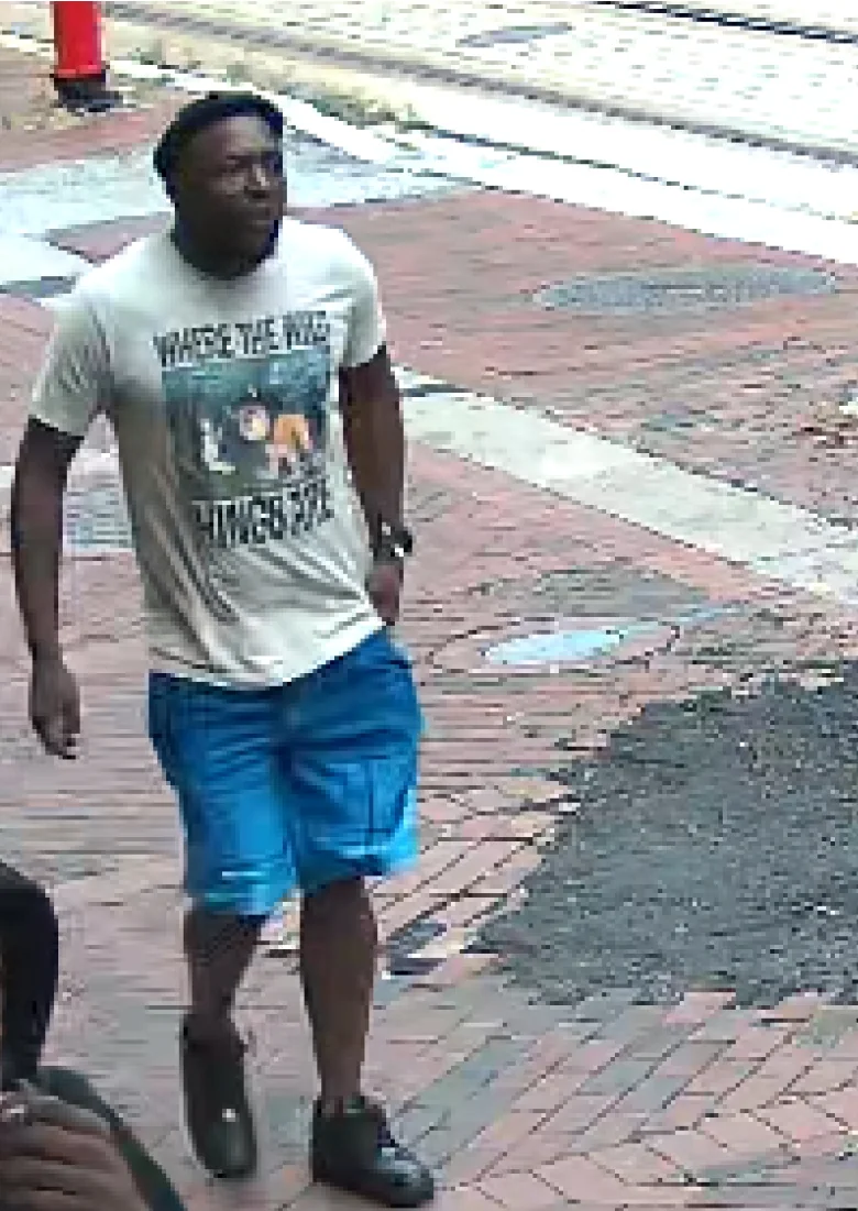 Camera captures person of interest in downtown Baltimore shooting Camera captures person of interest in downtown Baltimore shooting